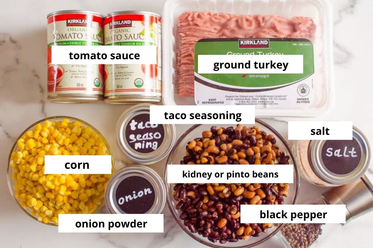 Kidney and pinto beans, ground turkey, corn, tomato sauce, taco seasoning, onion powder, salt and pepper. 