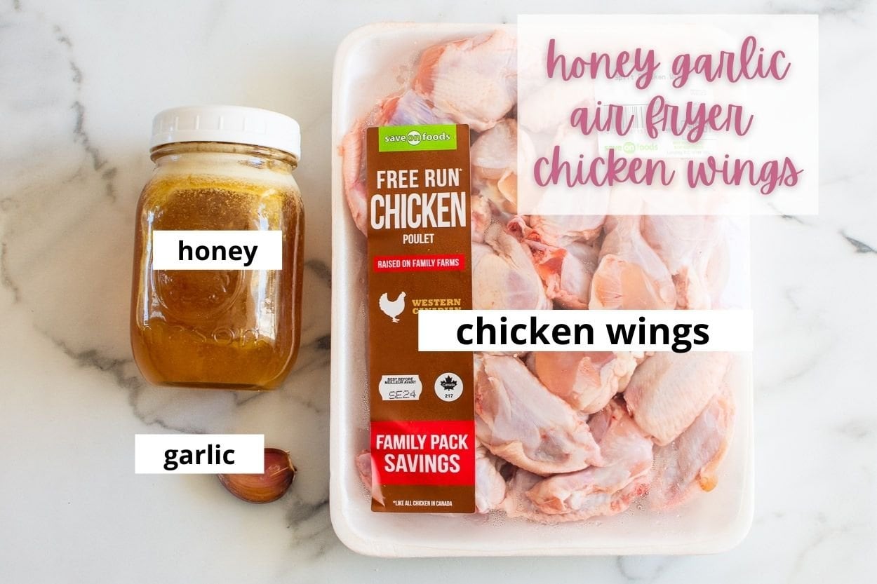 Honey, garlic, chicken wings on a kitchen counter.