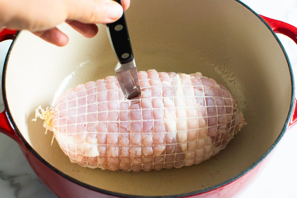 making slits in top of turkey roast