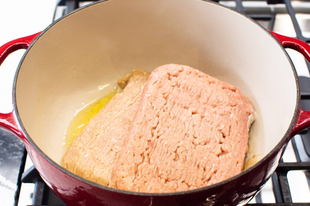 browning ground turkey in a large pot on stove