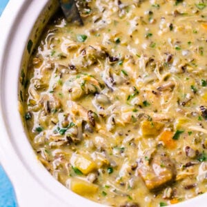 Healthy chicken wild rice soup in slow cooker.