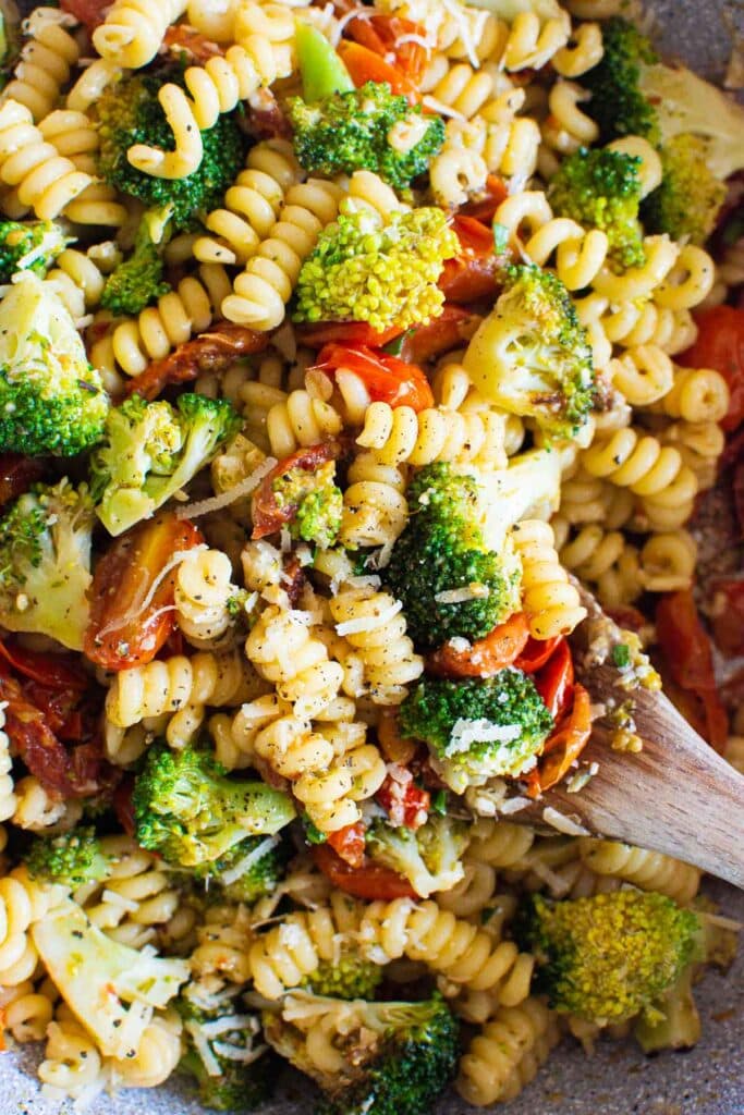 close up of healthy pasta with serving spoon