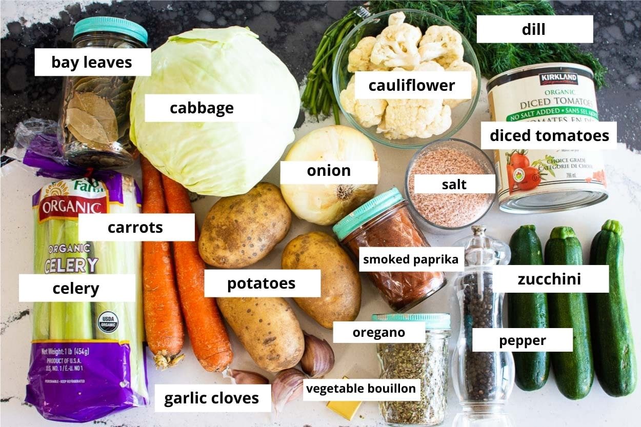 Diced tomatoes, zucchini, oregano, vegetable bouillon, garlic cloves, potatoes, carrots, celery, bay leaves, cabbage, onion, smoked paprika, salt, pepper, cauliflower, dill.
