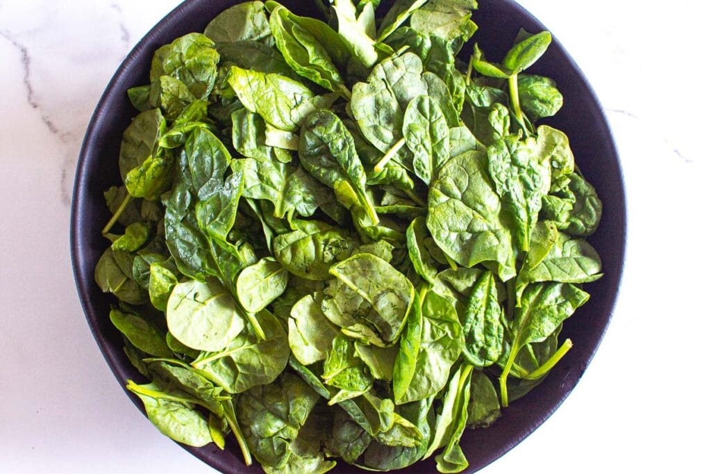 Spinach greens in a bowl.