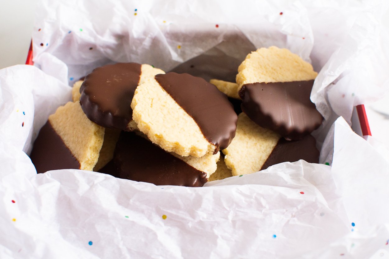 Almond flour shortbread cookies in a box for gifting.