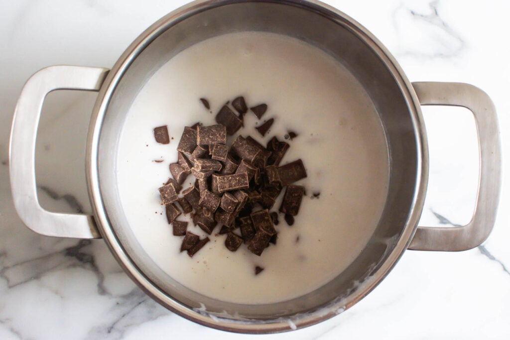 coconut milk and chocolate chips in a pot