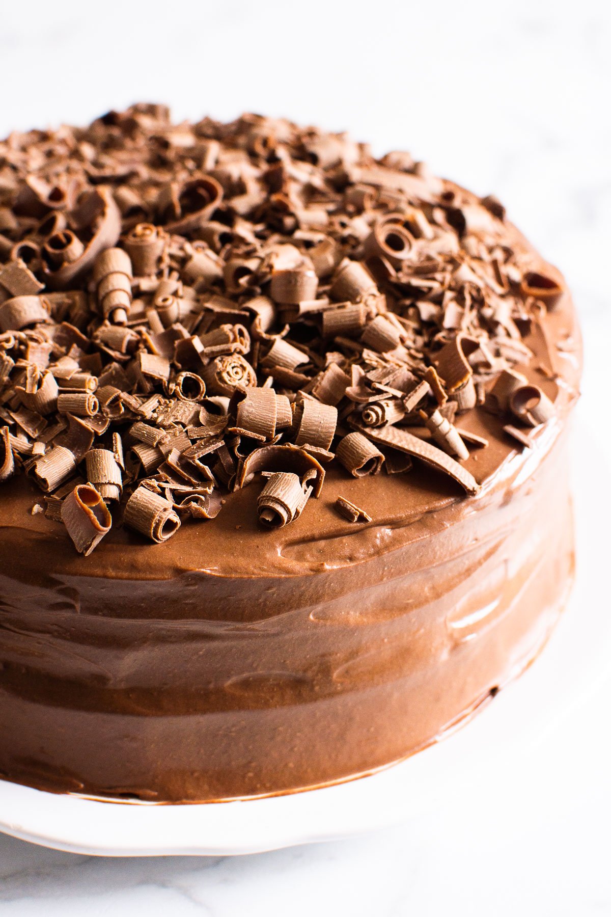 healthy chocolate cake with chocolate shavings on top