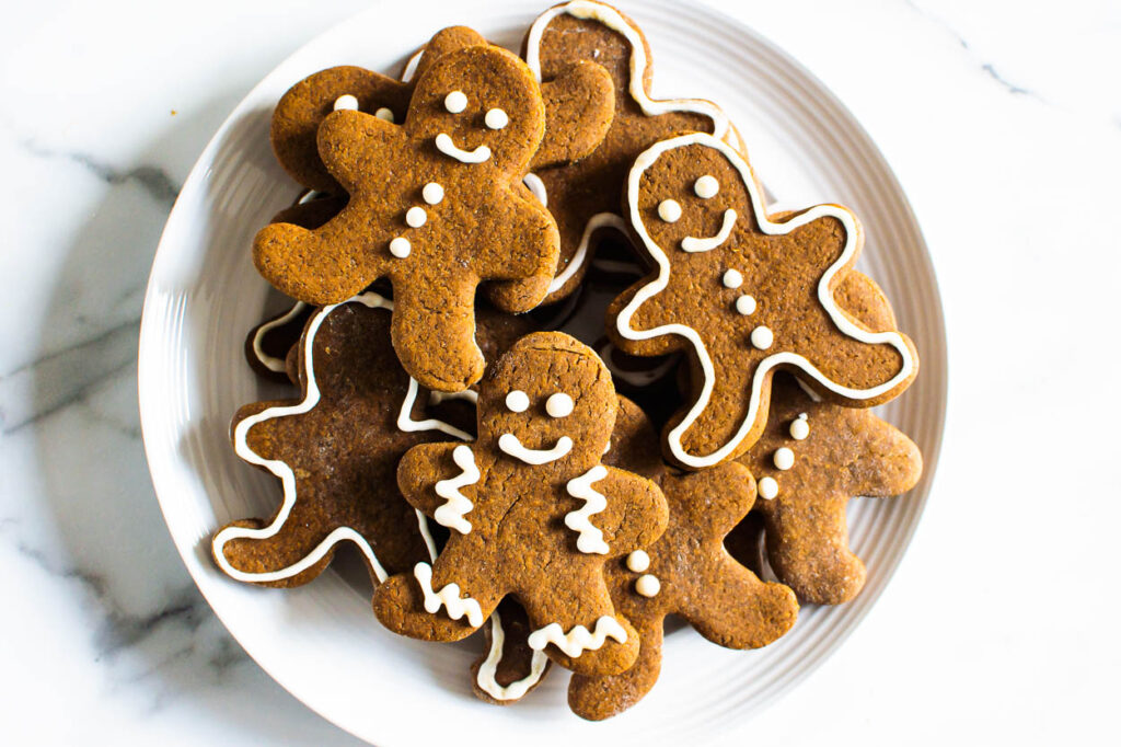 decorated healthier gingerbread cookies on a plate
