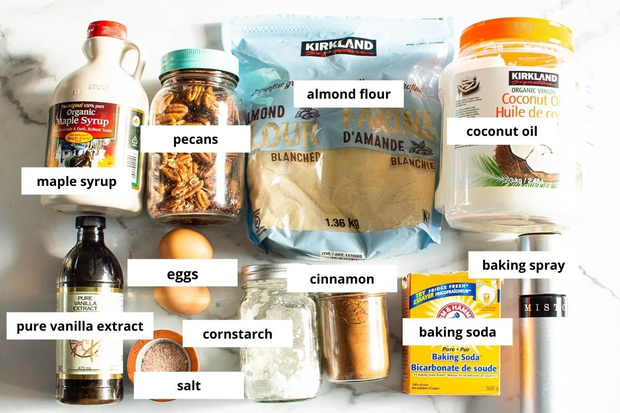 Almond flour, pecans, coconut oil, cinnamon, maple syrup, eggs, vanilla, cornstarch, baking soda, cooking spray, salt.