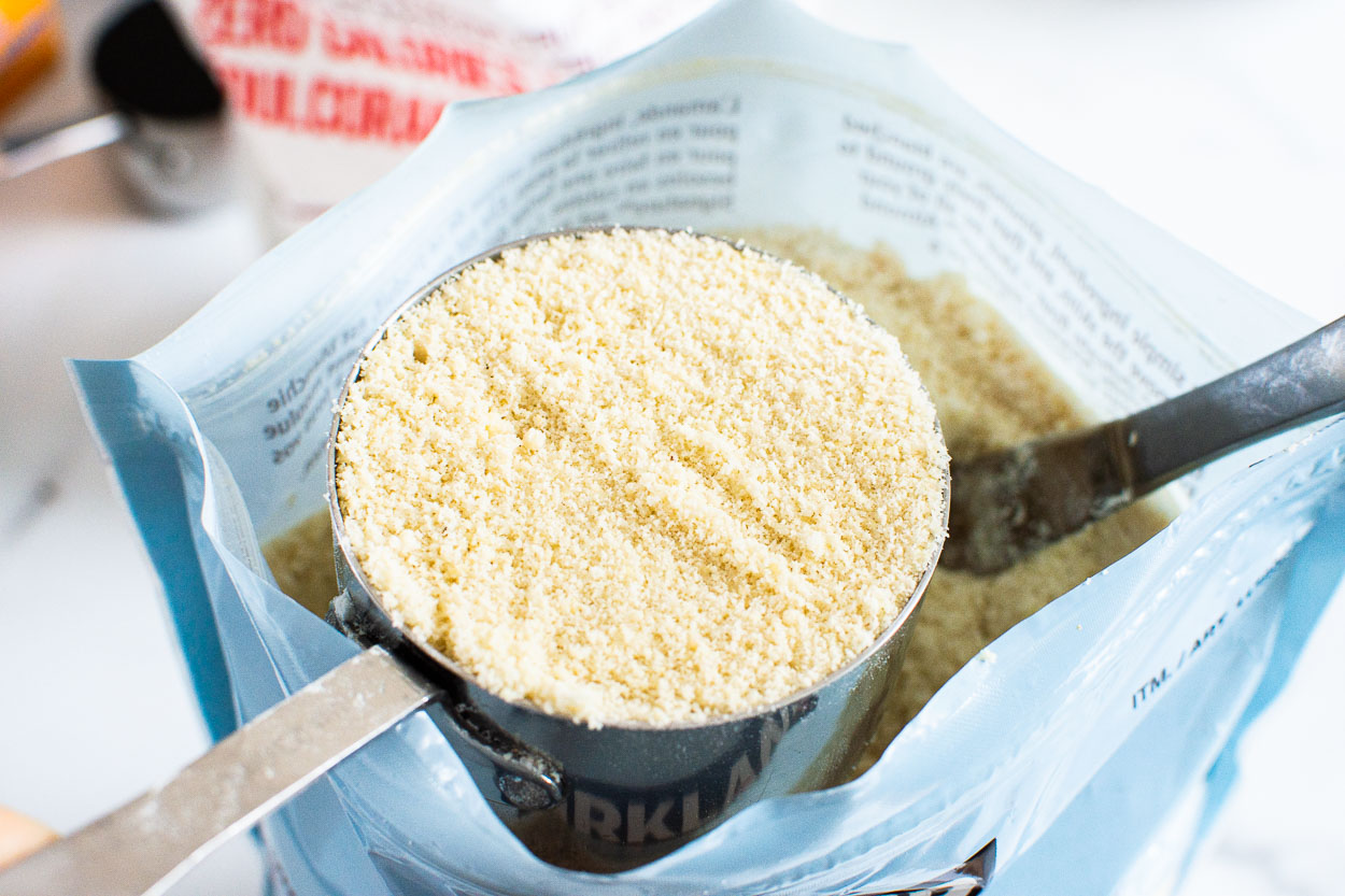 Measuring scoop in bag of almond flour. 