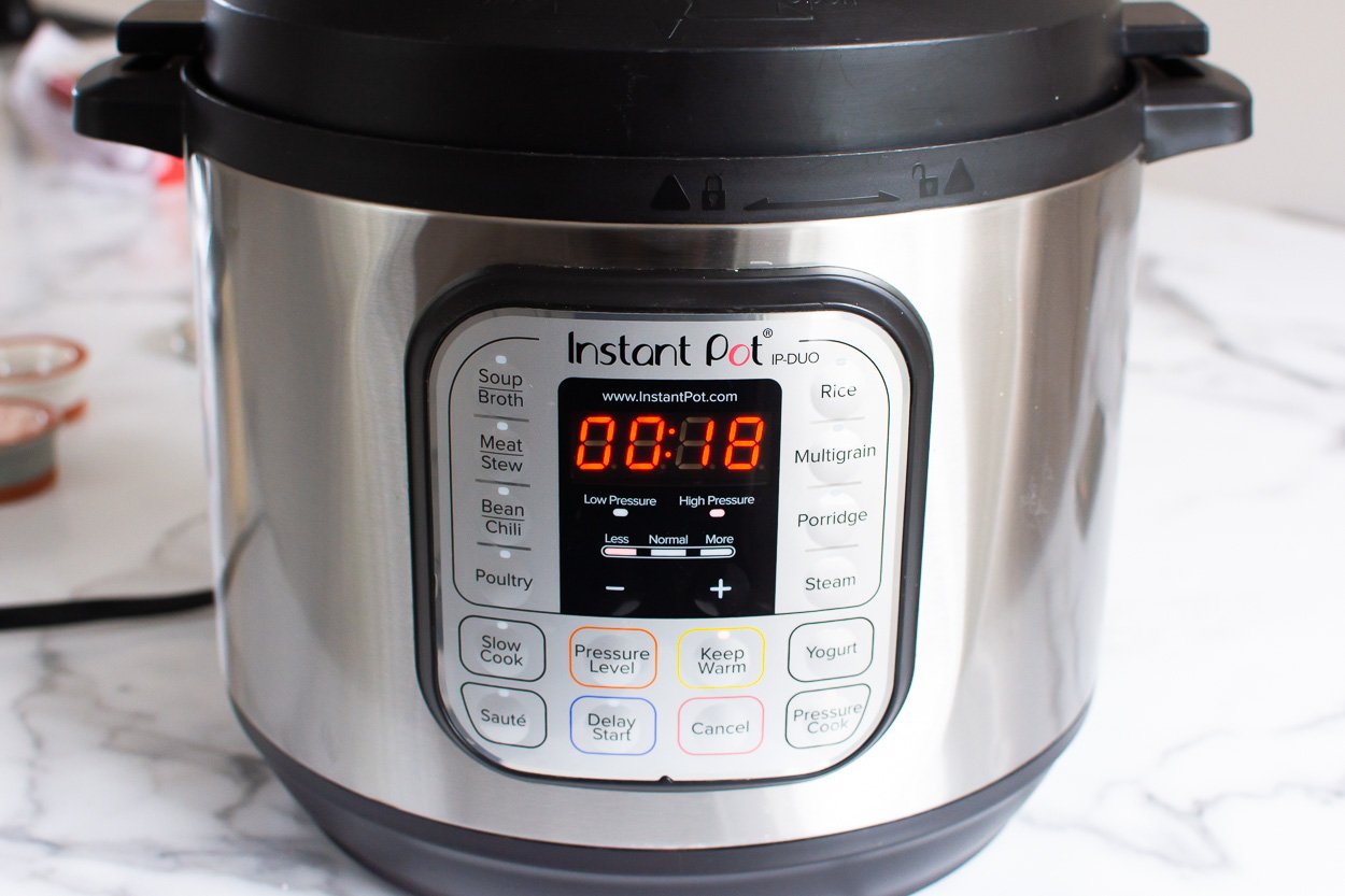 Instant Pot display shows 18 minutes manual cooking time.