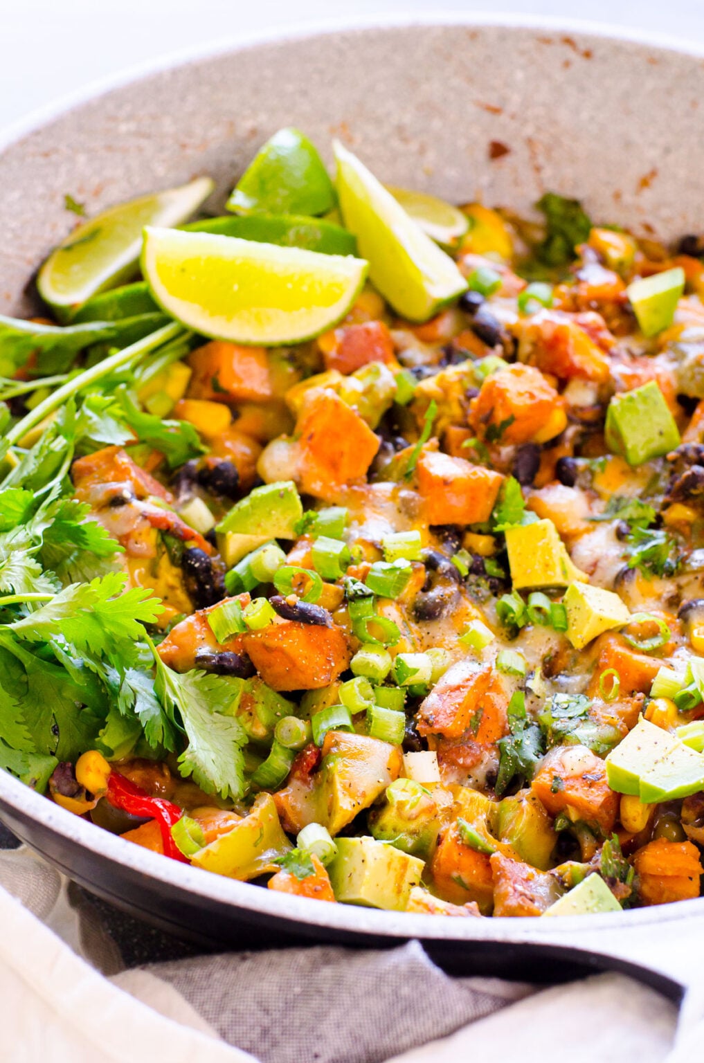 Tex-Mex sweet potato skillet black beans corn quinoa one-pan healthy cumin chipotle melted cheese hearty vegetarian