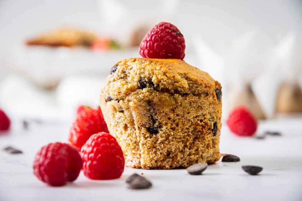 Banana protein muffins with berries and chocolate chips.