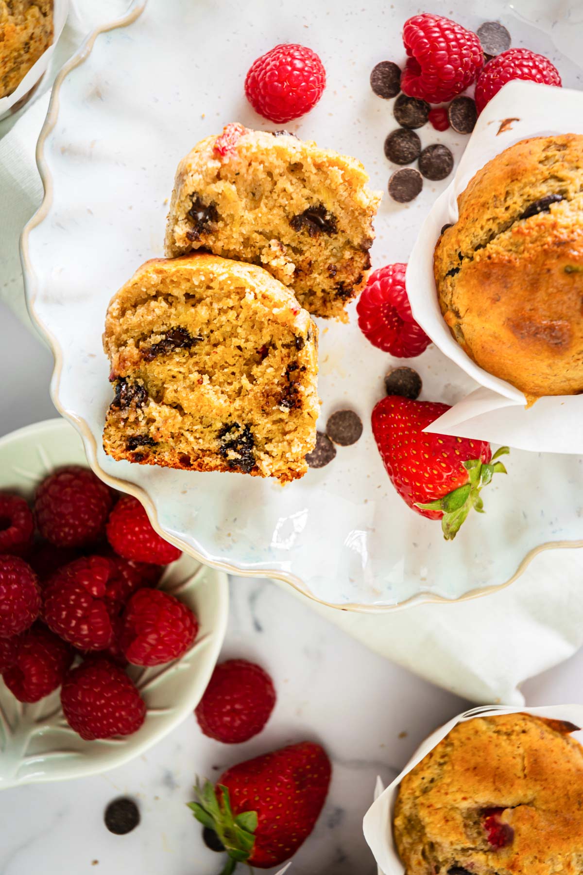 high protein muffins with chocolate chips and strawberries in a bowl