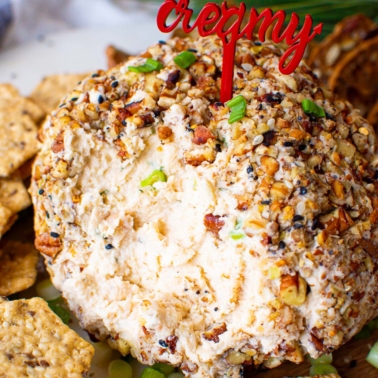 healthy cheese ball recipe on a platter with crackers