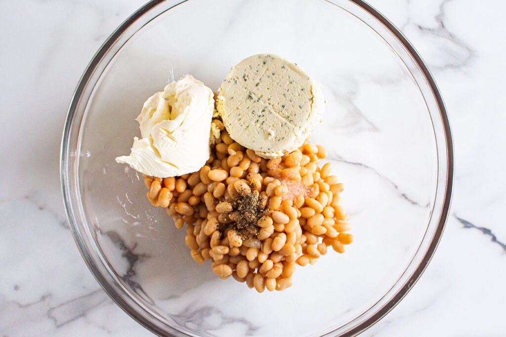beans and cream cheese with boursin in a bowl