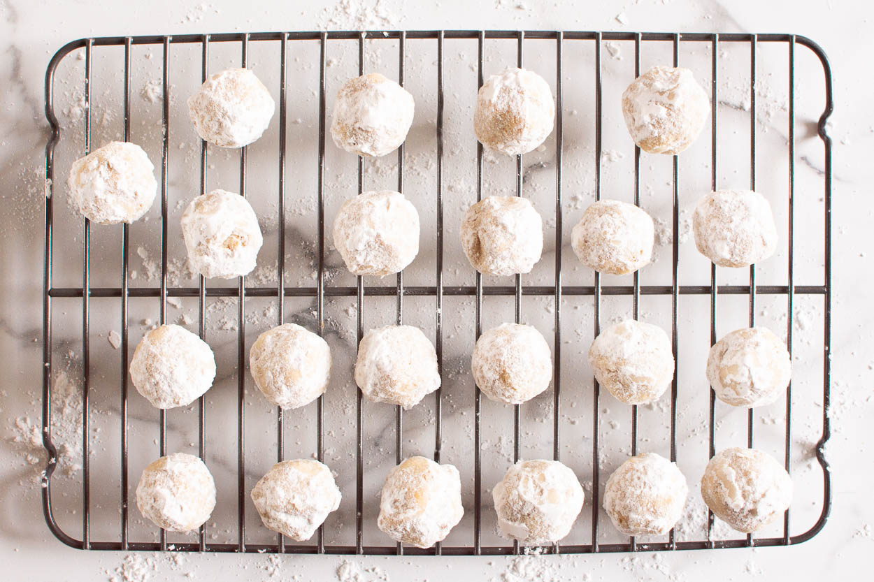 Healthy Snowball Cookies" />
	
	
	
	
	
	
	
	
	
	
	
	
	
	{"@context":"https://schema.org","@graph":[{"@type":"Organization","@id":"https://ifoodreal.com/#organization","name":"iFoodreal","url":"https://ifoodreal.com/","sameAs":["https://www.facebook.com/iFOODreal/","https://www.instagram.com/ifoodreal/","https://www.pinterest.com/ifoodreal/","https://twitter.com/ifoodreal"],"logo":{"@type":"ImageObject","@id":"https://ifoodreal.com/#logo","inLanguage":"en-US","url":"https://ifoodreal.com/wp-content/uploads/2017/11/ifrLogo-1.png","contentUrl":"https://ifoodreal.com/wp-content/uploads/2017/11/ifrLogo-1.png","width":150,"height":37,"caption":"iFoodreal"},"image":{"@id":"https://ifoodreal.com/#logo"}},{"@type":"WebSite","@id":"https://ifoodreal.com/#website","url":"https://ifoodreal.com/","name":"iFOODreal.com","description":"","publisher":{"@id":"https://ifoodreal.com/#organization"},"potentialAction":[{"@type":"SearchAction","target":{"@type":"EntryPoint","urlTemplate":"https://ifoodreal.com/?s={search_term_string}"},"query-input":"required name=search_term_string"}],"inLanguage":"en-US"},{"@type":"ImageObject","@id":"https://ifoodreal.com/healthy-snowball-cookies/#primaryimage","inLanguage":"en-US","url":"https://ifoodreal.com/wp-content/uploads/2021/12/fg-healthy-snowballs-cookies-recipe-with-almond-flour.jpg","contentUrl":"https://ifoodreal.com/wp-content/uploads/2021/12/fg-healthy-snowballs-cookies-recipe-with-almond-flour.jpg","width":1250,"height":1250,"caption":"healthy snowball cookies in a holiday box with a touch of greenery"},{"@type":["WebPage","FAQPage"],"@id":"https://ifoodreal.com/healthy-snowball-cookies/#webpage","url":"https://ifoodreal.com/healthy-snowball-cookies/","name":"Healthy Snowball Cookies {with Almond Flour}