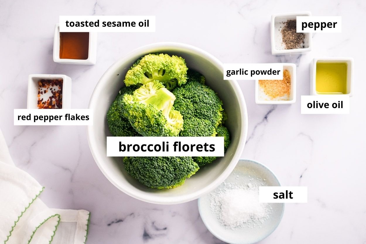 Broccoli florets, salt, pepper, olive oil, garlic powder, toasted sesame oil, red pepper flakes.