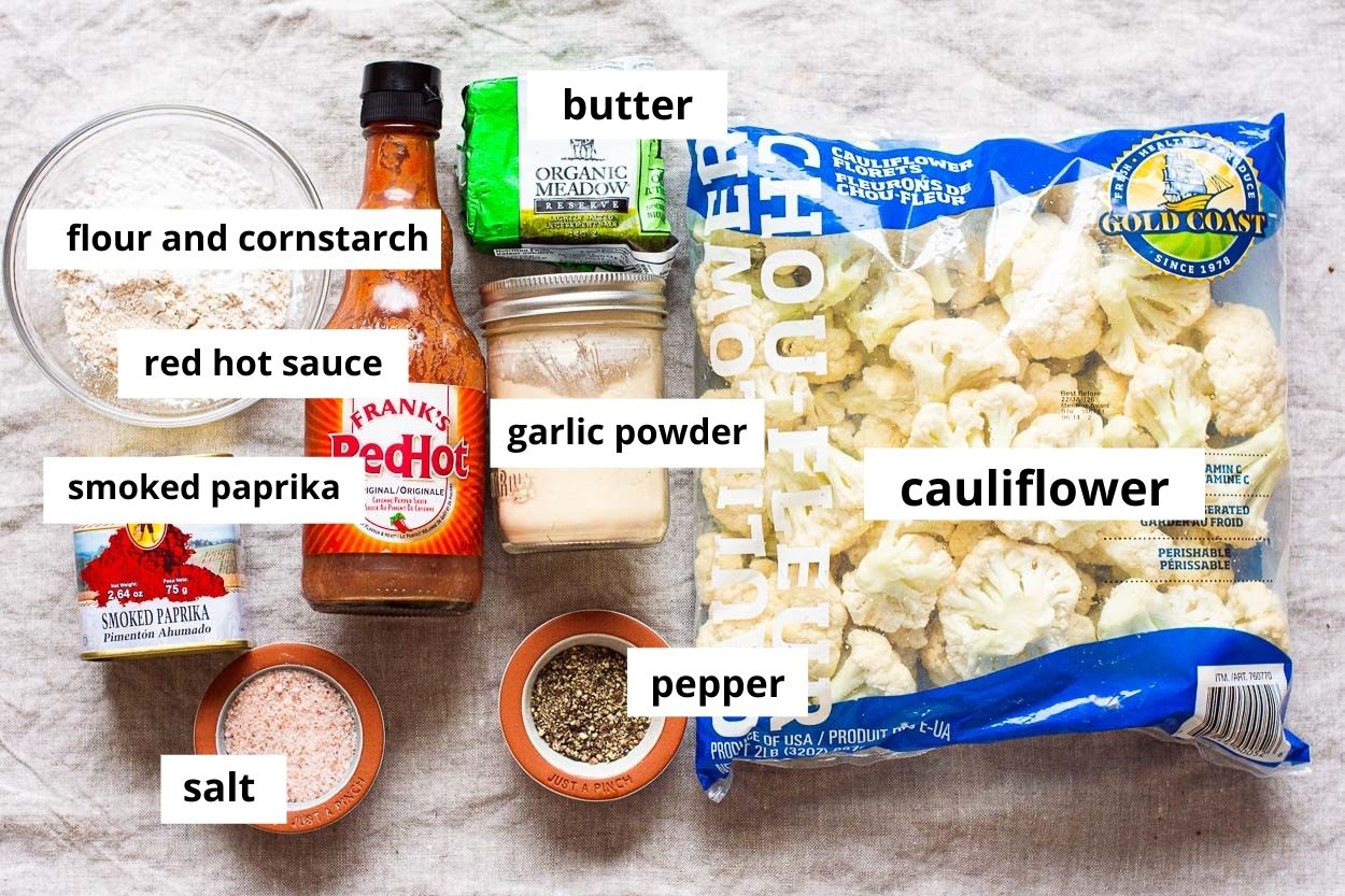 Hot sauce, smoked paprika, butter, flour, cornstarch, salt, pepper, garlic powder, cauliflower florets.