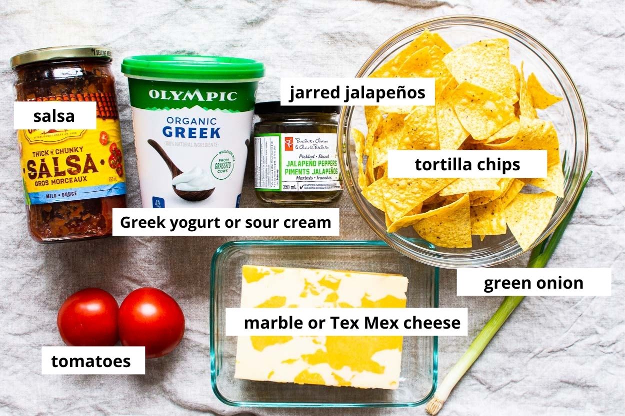 Tortilla chips, Greek yogurt, salsa, cheese, jalapenos, green onion. 