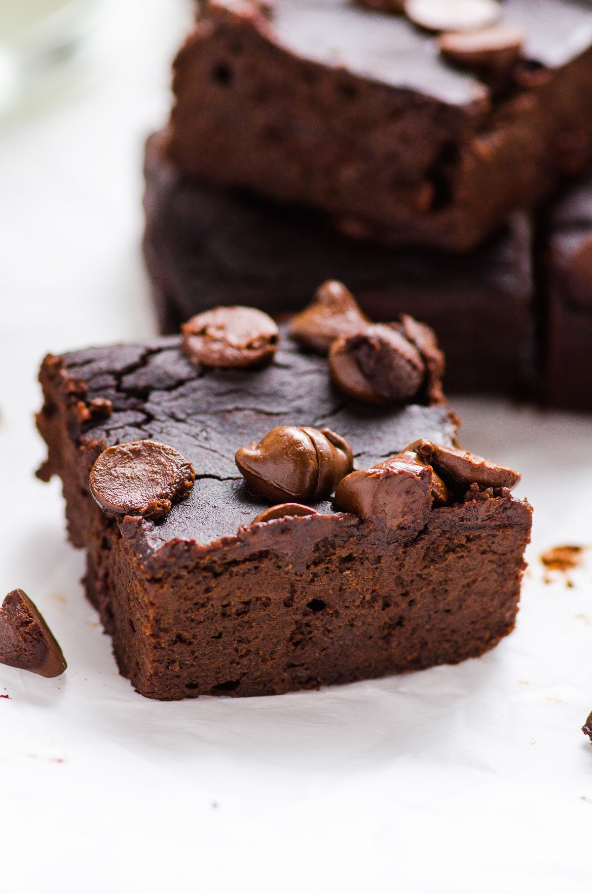 Close up of black bean brownies with chocolate chips.