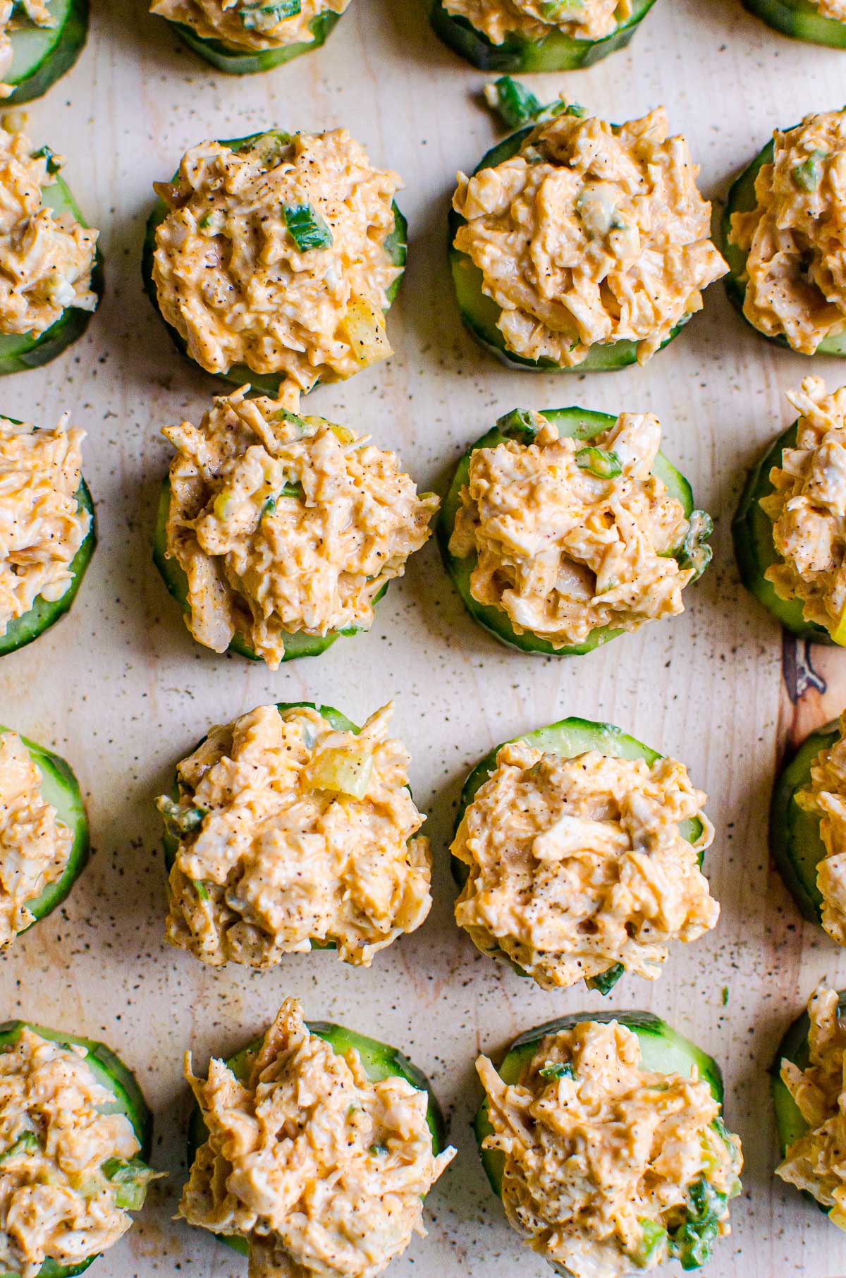 Cucumber appetizer bites with creamy buffalo chicken.