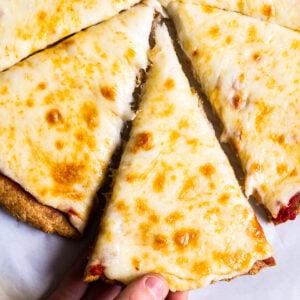 almond flour pizza crust recipe topped with cheese and marinara