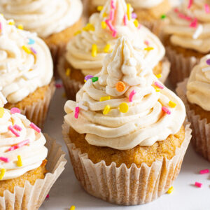 Healthy vanilla cupcakes with icing and sprinkes