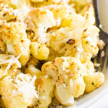 oven roasted cauliflower parmesan in a bowl