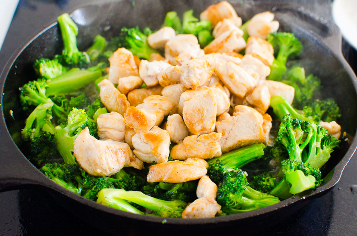 adding chicken back to skillet for chicken and broccoli stir fry
