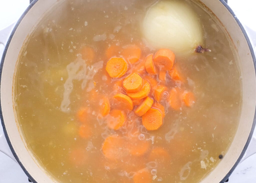 add potatoes and carrots to soup