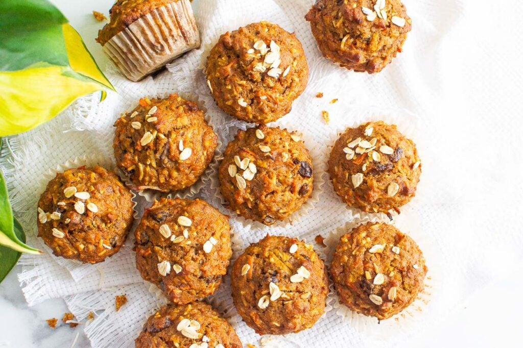 healthy morning glory muffins on white towel