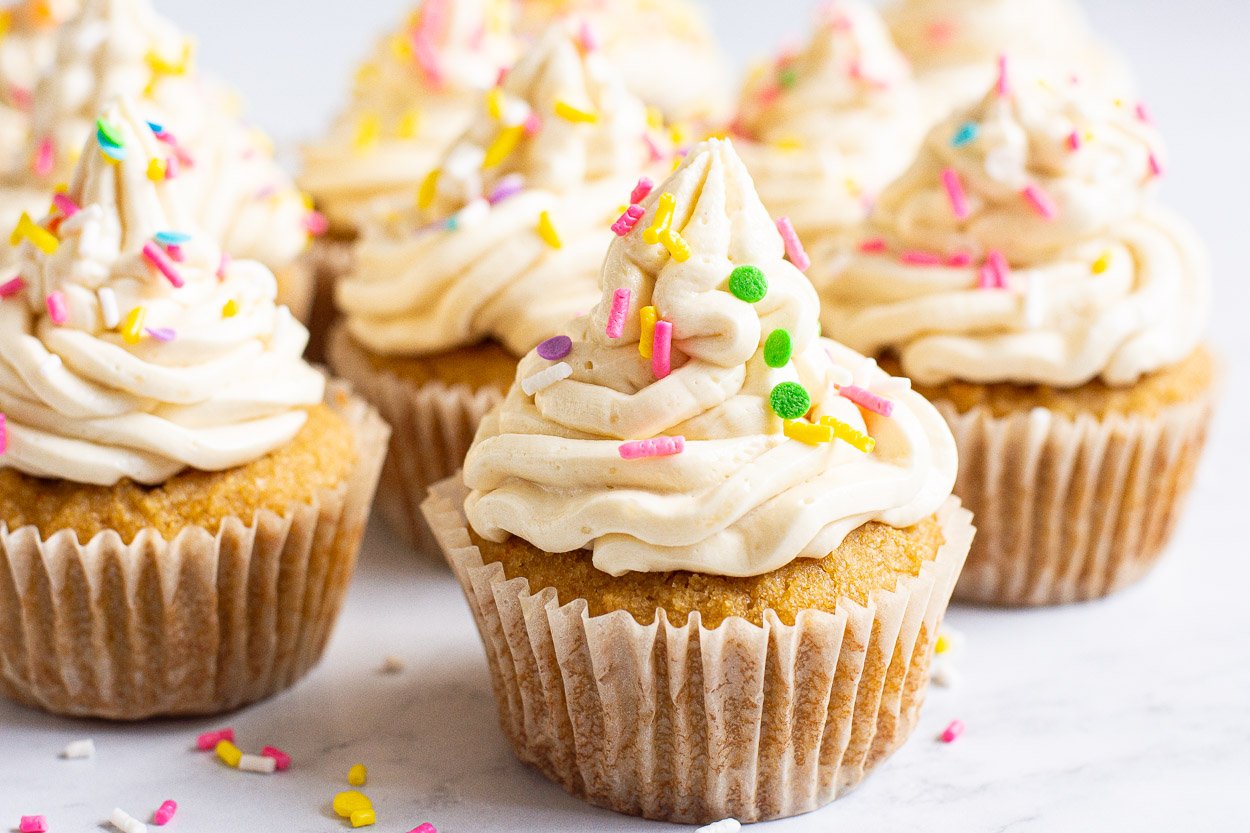 Healthy cupcakes decorated with healthy frosting and sprinkles.