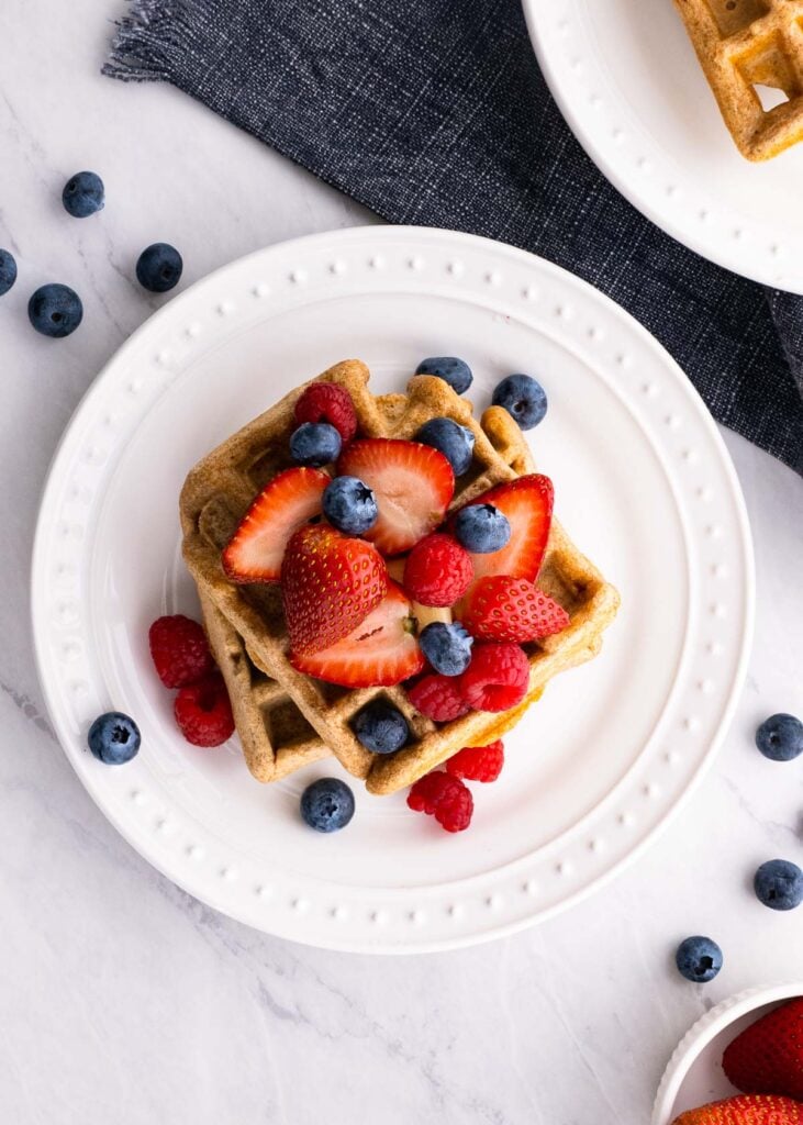healthy waffle recipe on a plate with fresh berries