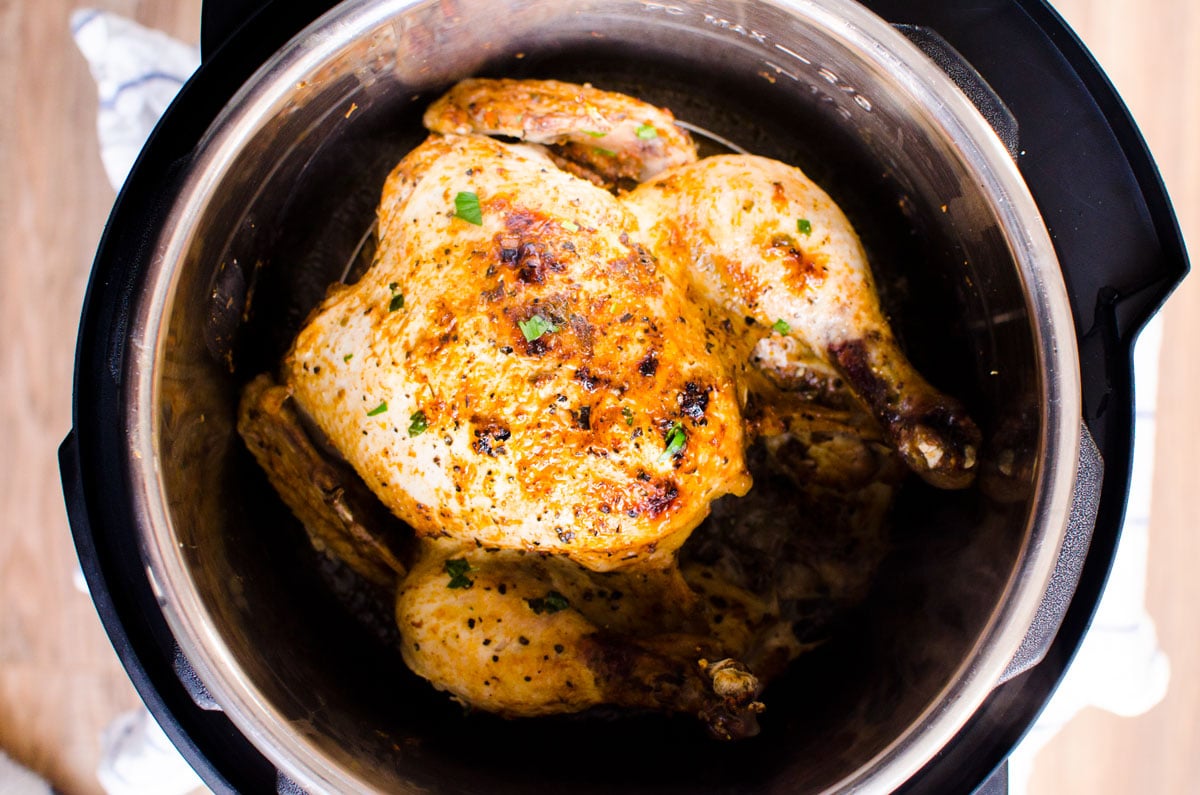 Instant pot roast chicken in a pressure cooker.