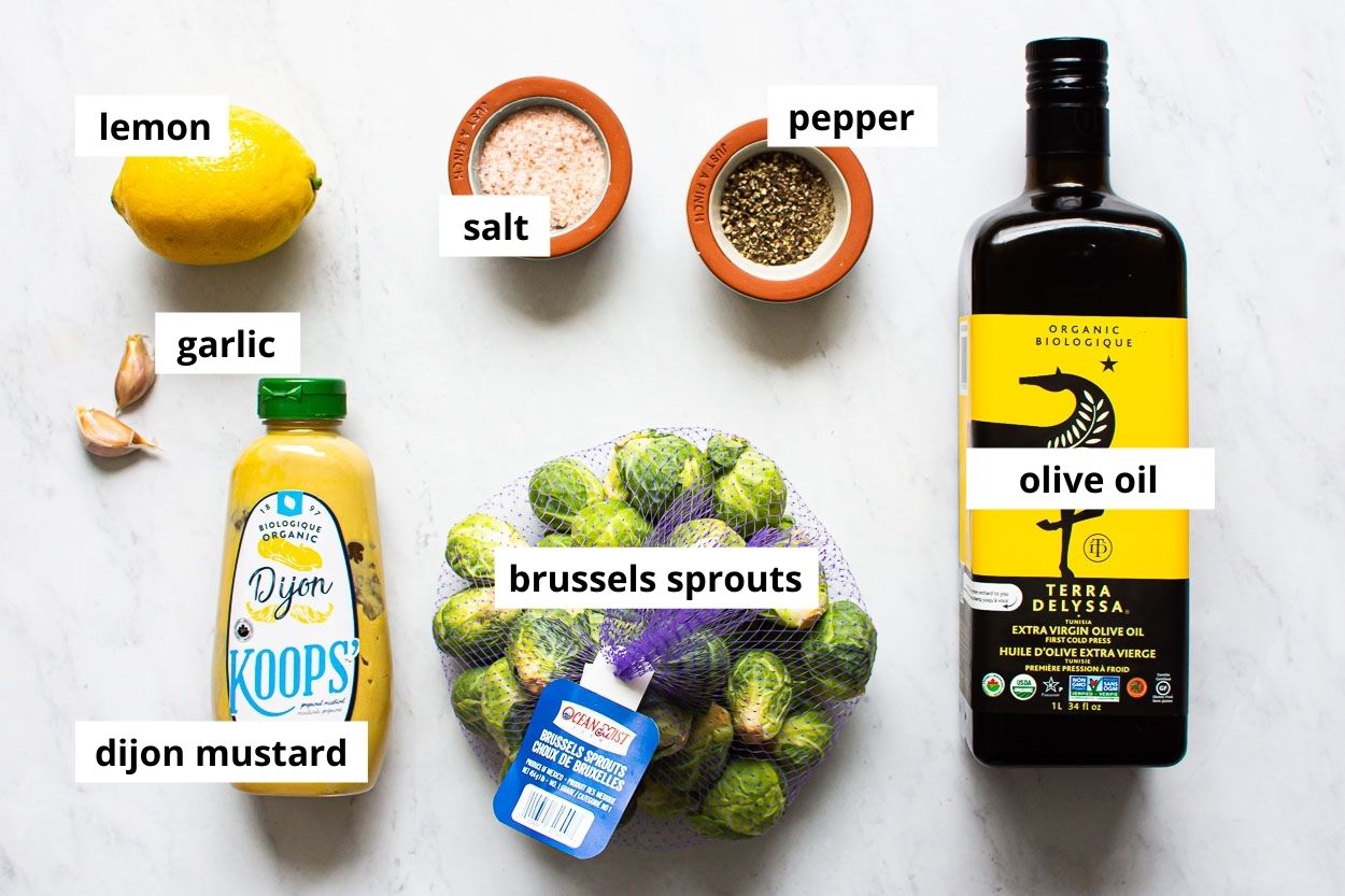 Brussels sprouts, lemon, olive oil, garlic, dijon mustard, salt and pepper.