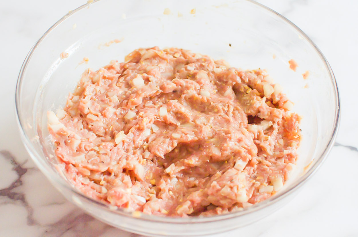 healthy ground turkey meatloaf mixture in glass bowl