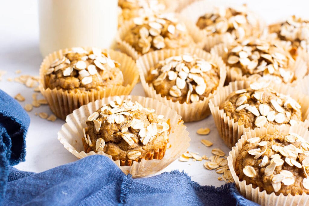 healthy oatmeal muffins with a blue linen