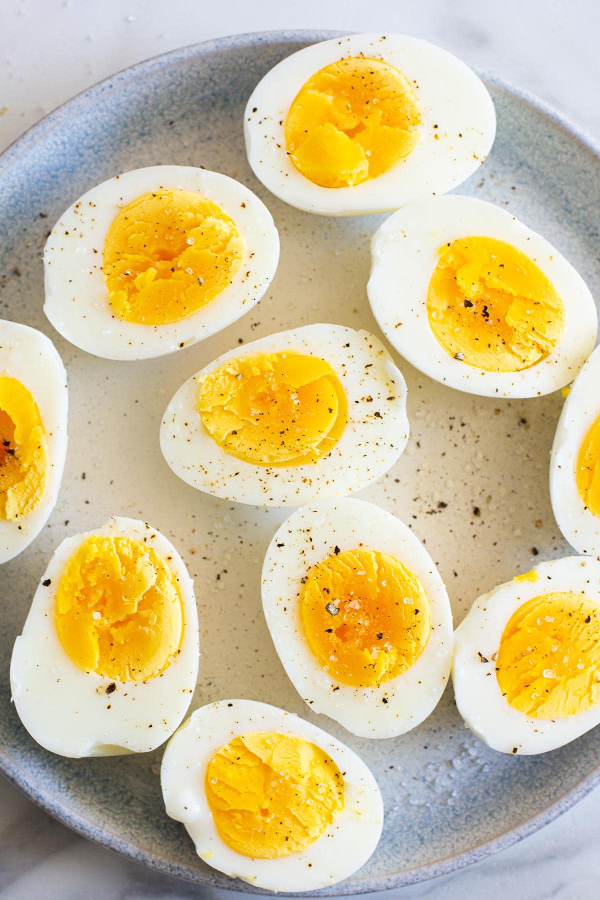 Close up for hard boiled eggs that are cut in half.