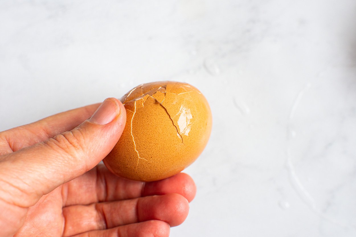 Cracked hard boiled egg to easily peel.