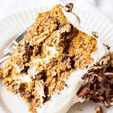 a slice of almond flour carrot cake on a plate