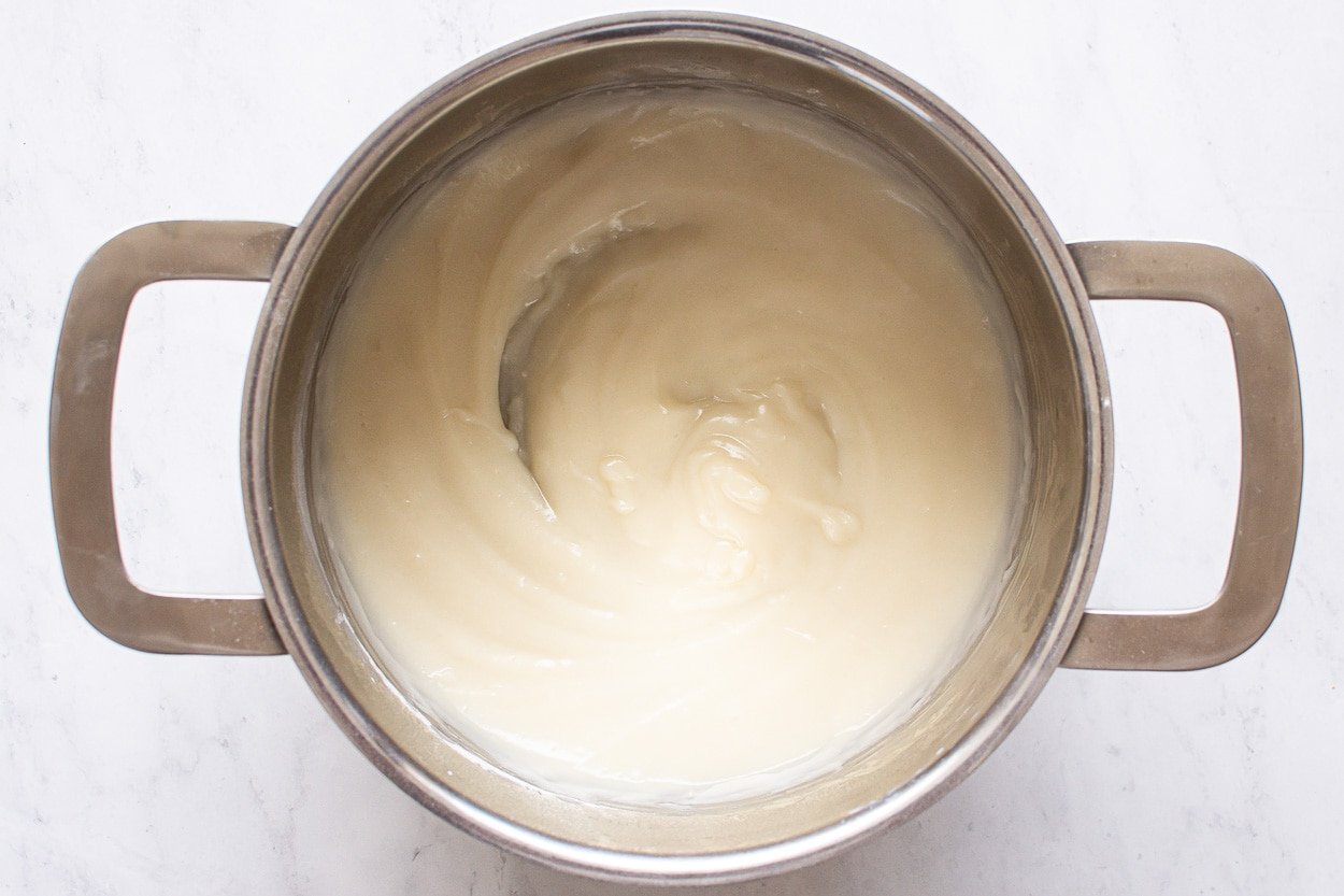 Frosting mixture in saucepan.