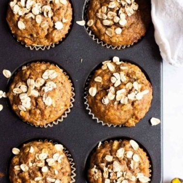 Healthy banana oatmeal muffins in a muffin tin.