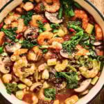 Shrimp stir fry garnished with sesame seeds.