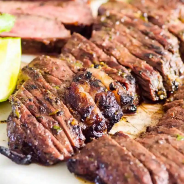 Sliced authentic carne asada steak.