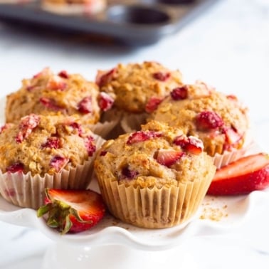 Healthy strawberry muffins with fresh strawberries.