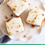 Healthy carrot cake bars on serving plate.