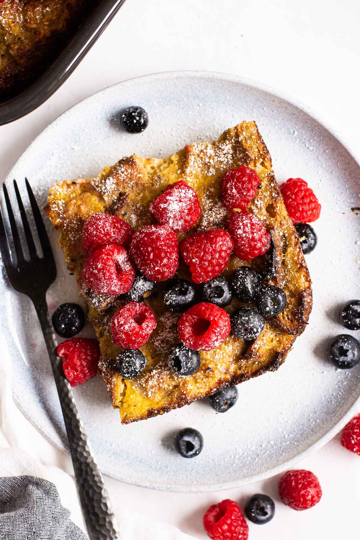 A slice of healthy french toast casserole on a plate.