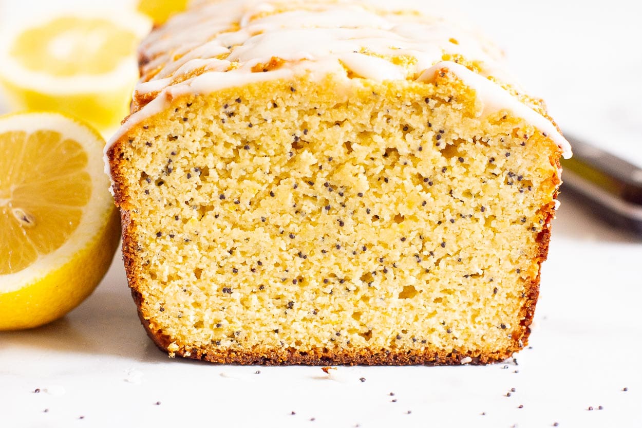 Sliced loaf of healthy lemon poppy seed bread.