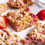 Healthy strawberry oatmeal bars cut into squares.